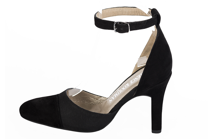 Matt black women's open side shoes, with a strap around the ankle. Round toe. Very high kitten heels. Profile view - Florence KOOIJMAN
